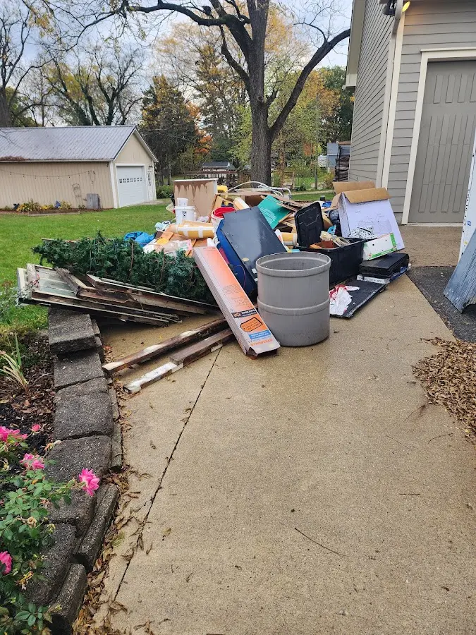 Dumpster being loaded with debris for Commercial Dumpster Rental in Somerton